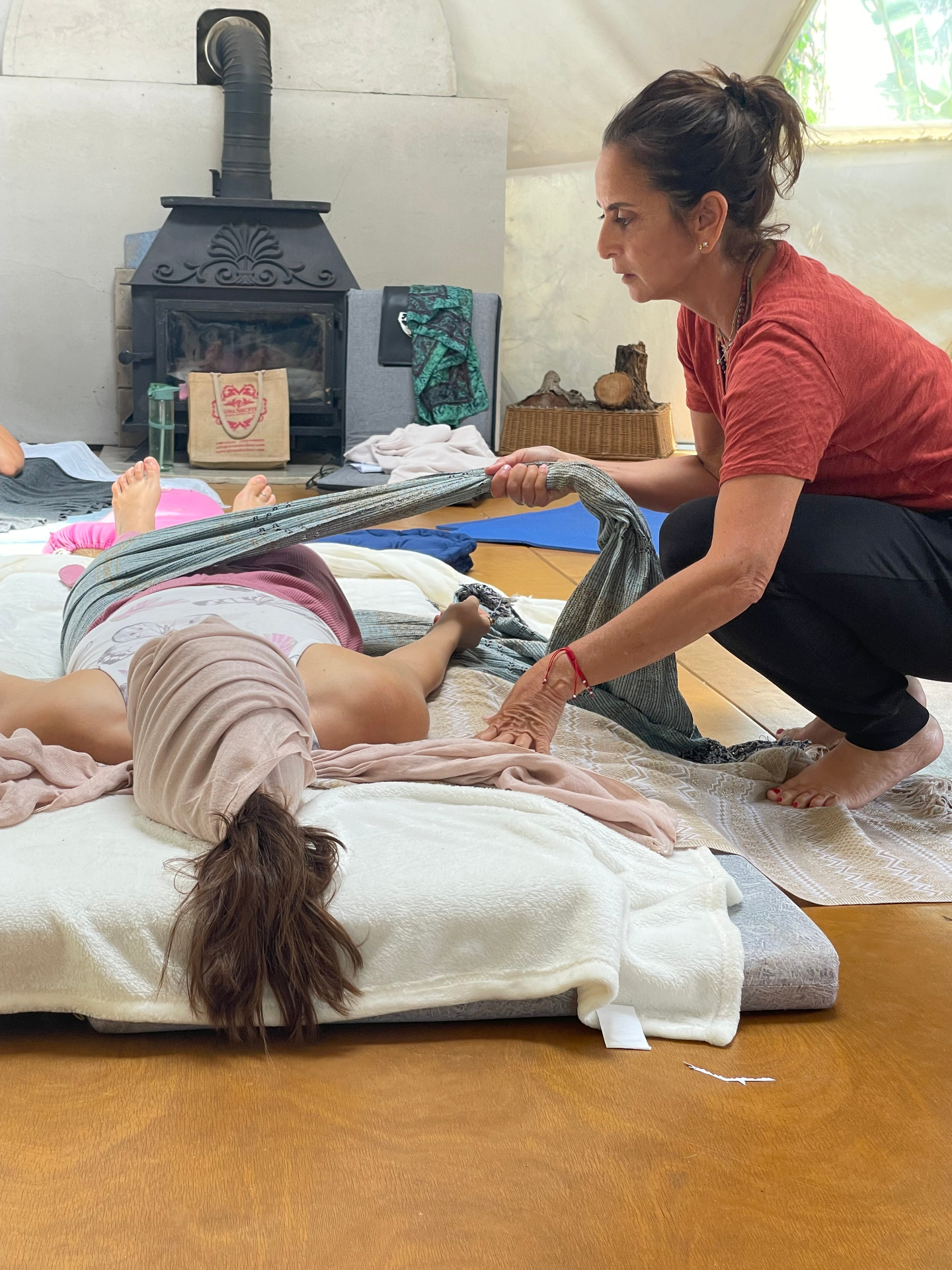 Melissa guiding a participant during an embodied breathwork session