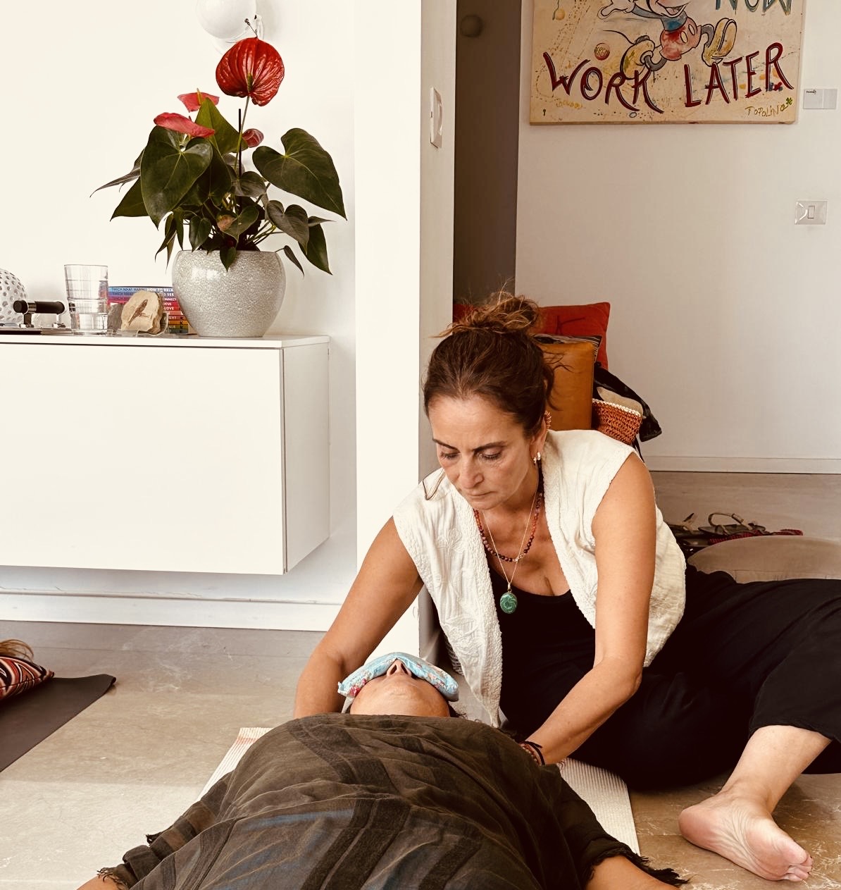 Melissa accompanying a client through a deep breathwork process
