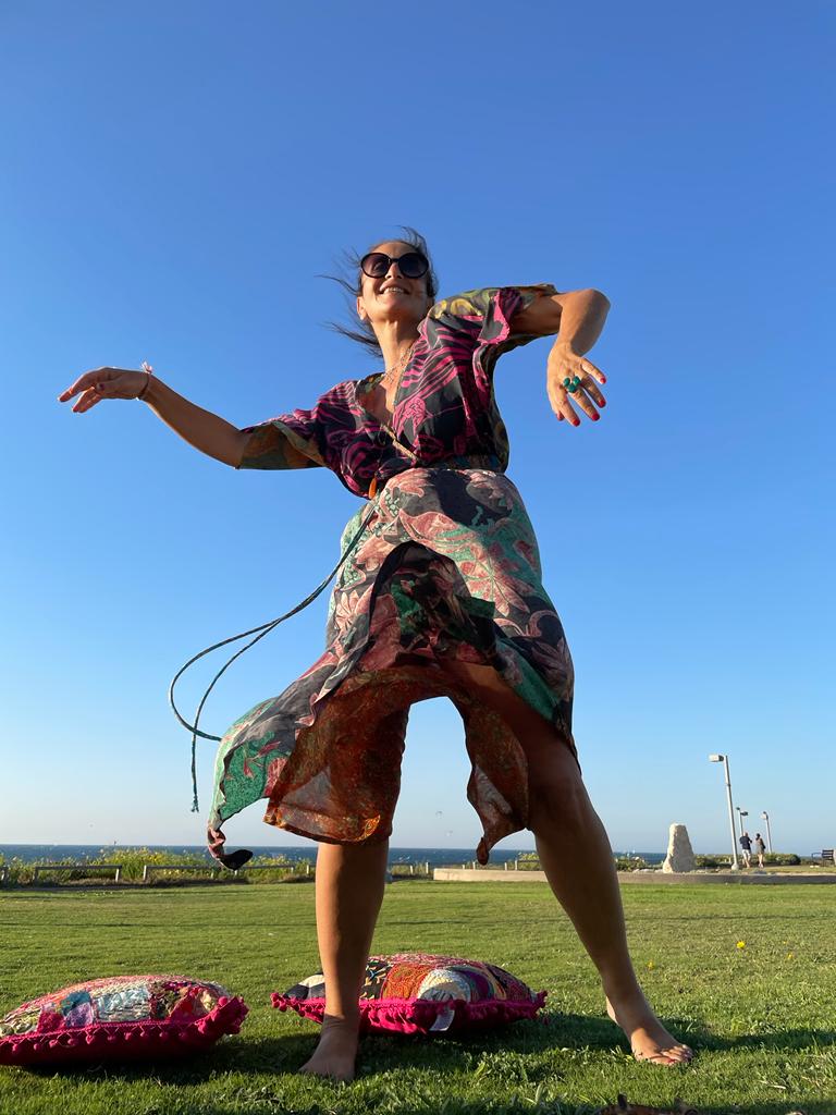 Melissa dancing by the sea