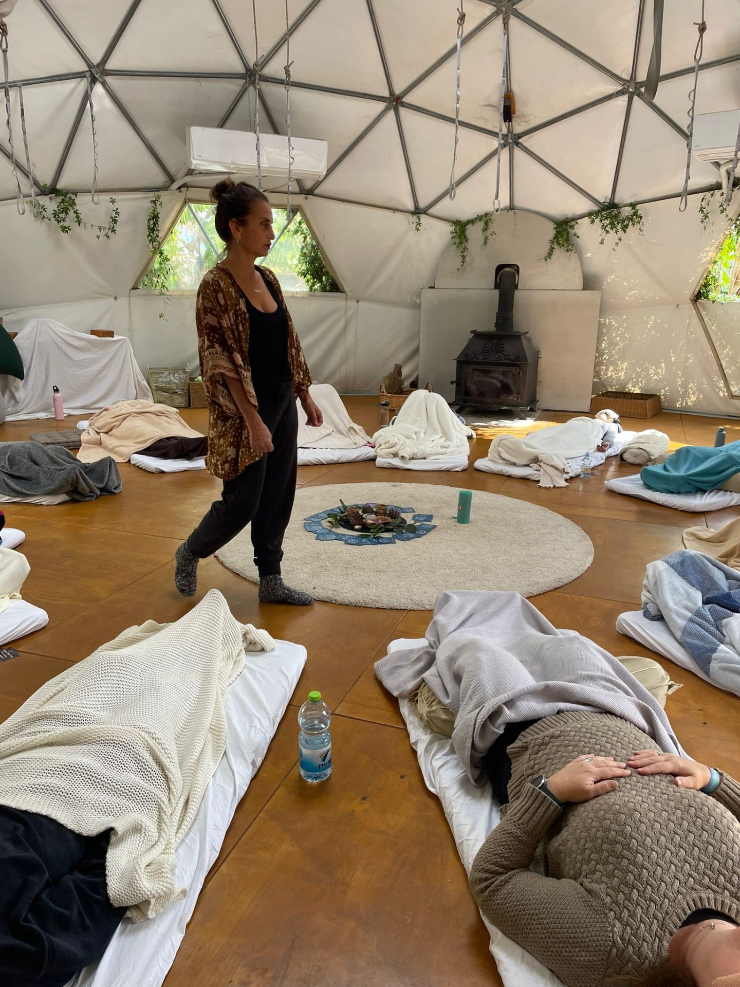 Melissa facilitating inside a practice dome